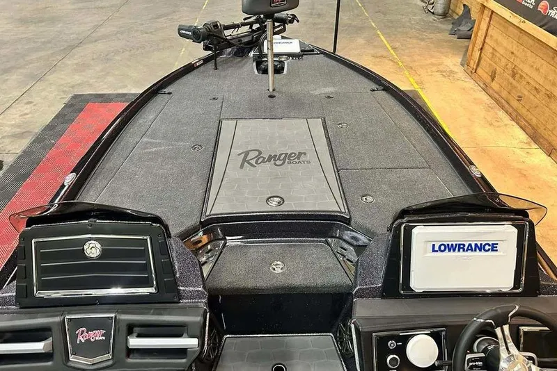 Slide: The Image of 2014 Ranger Z521R Cup-Equipped boat deck with Lowrance electronics and Ranger branding. - 5