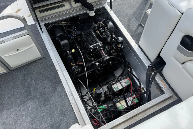 Slide: The Image of Engine compartment of a 2006 Bennington 2875RLTD I/O boat, showcasing internal components. - 27