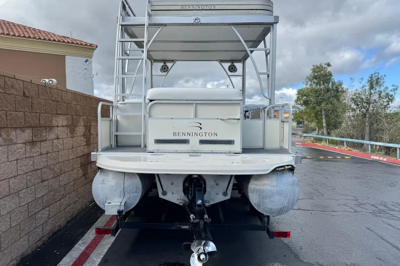 Slide: The Image of 2006 Bennington 2875RLTD I/O pontoon boat, rear view, parked on a street. - 5