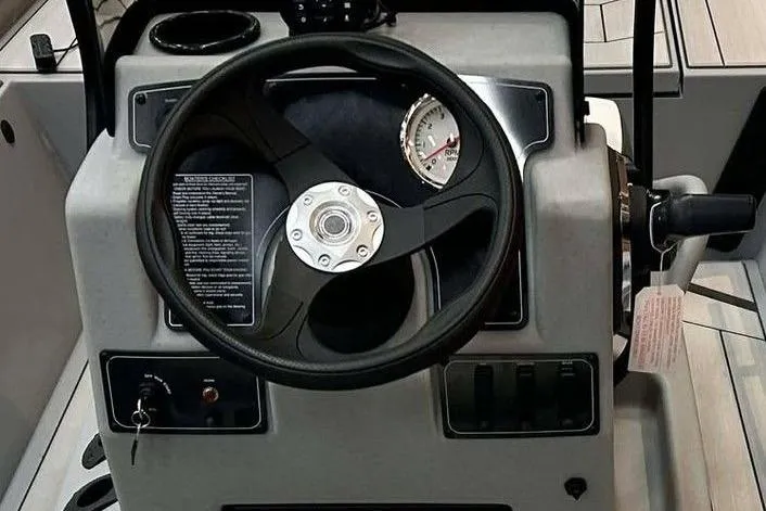 Slide: The Image of Steering console of 2026 Tracker Bass Tracker Classic CC boat. - 3