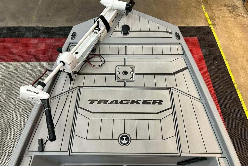 Slide: The Image of 2026 Tracker Bass Tracker Classic CC boat deck with trolling motor, featuring sleek design. - 7