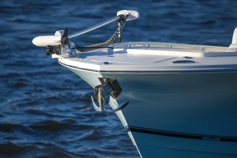 Slide: The Image of 2016 Regulator 41 boat bow with anchor on blue water. - 27