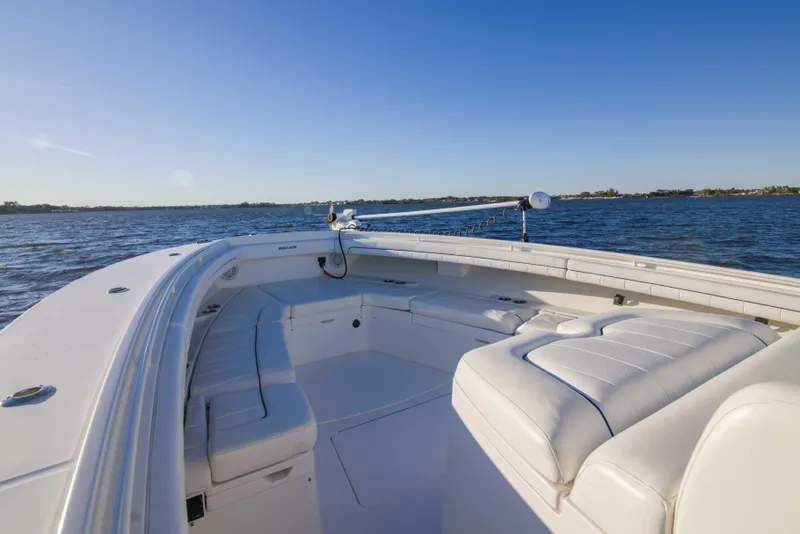 Slide: The Image of 2016 Regulator 41 boat interior with white seating on open water. - 3