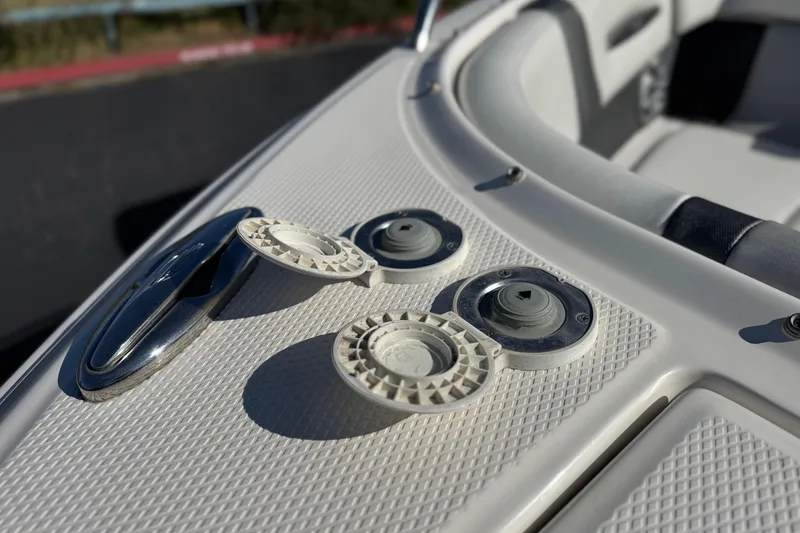 Slide: The Image of Close-up of 2017 Chaparral 2870 SSX boat deck with fittings and textured surface. - 15