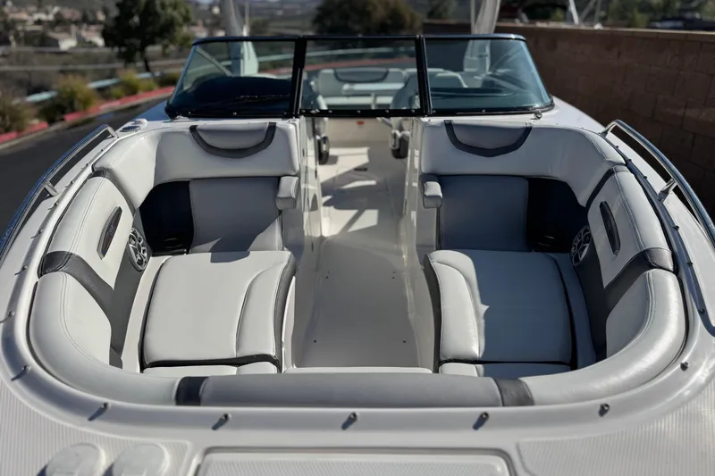 Slide: The Image of 2017 Chaparral 2870 SSX boat interior with luxurious seating and sleek design. - 16