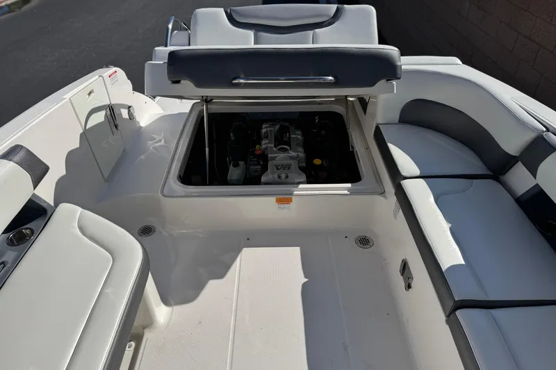 Slide: The Image of 2017 Chaparral 2870 SSX boat interior with open engine compartment. - 27