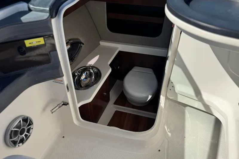 Slide: The Image of 2017 Chaparral 2870 SSX boat interior with sink and toilet. - 31