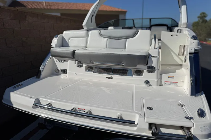 Slide: The Image of 2017 Chaparral 2870 SSX boat with spacious rear seating and swim platform. - 6