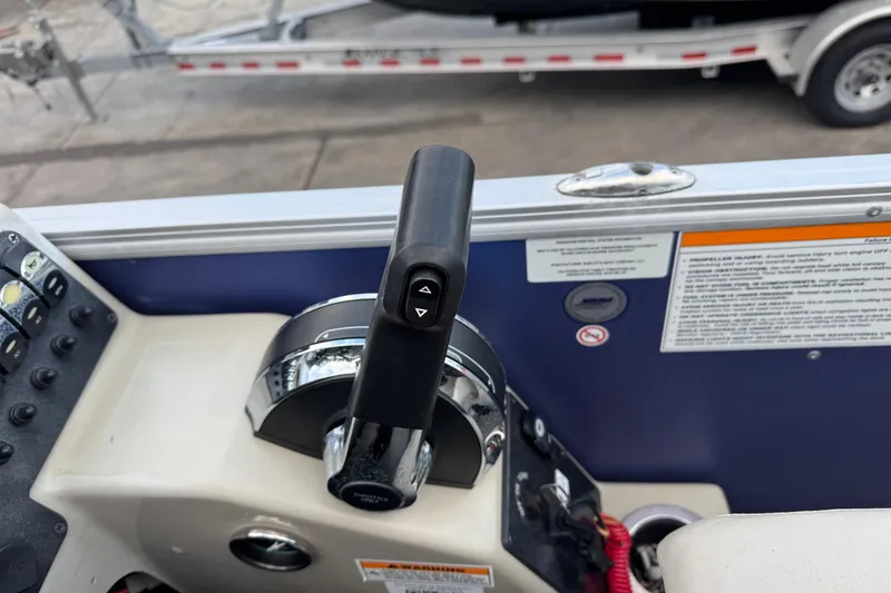 Slide: The Image of Control panel of 2023 Barletta ARIA 22QC boat with throttle lever and switches. - 47