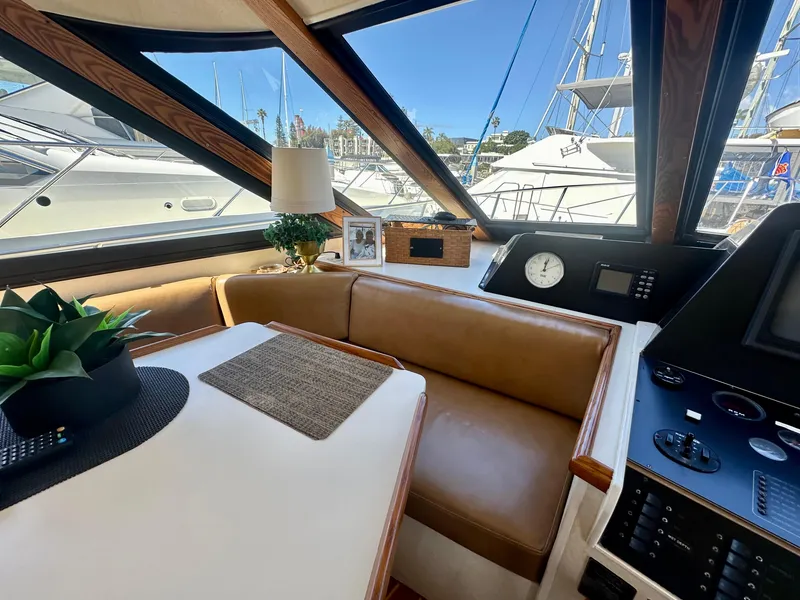 Slide: The Image of Interior of 1993 Tollycraft 57 Pilothouse yacht with elegant furnishings. - 10