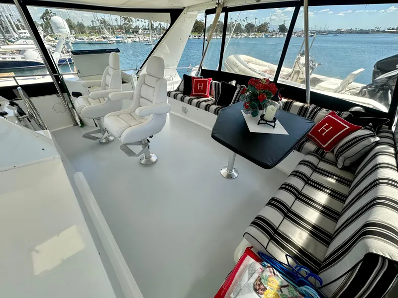 Slide: The Image of Interior of a 1993 Tollycraft 57 Pilothouse yacht with luxurious seating. - 24