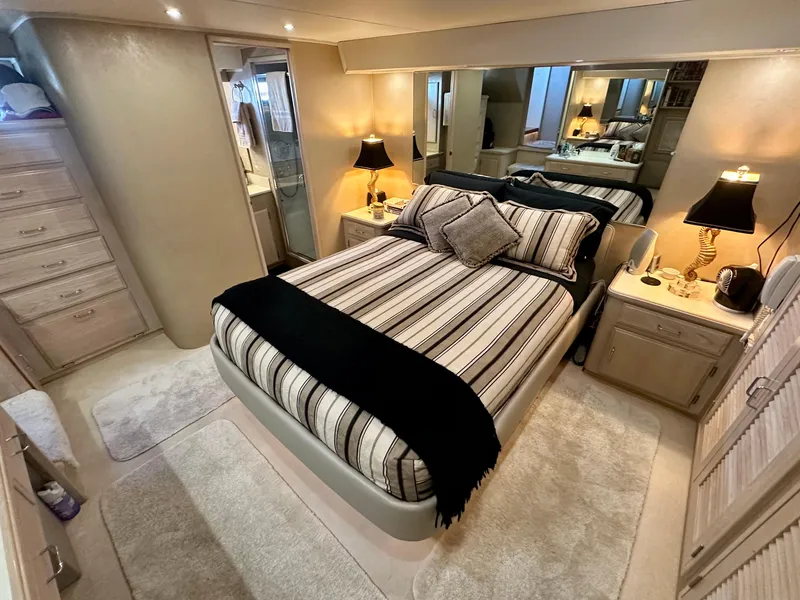 Slide: The Image of Luxurious bedroom on a 1993 Tollycraft 57 Pilothouse yacht. - 12