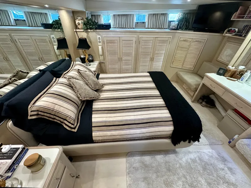Slide: The Image of Luxurious bedroom on a 1993 Tollycraft 57 Pilothouse yacht. - 13