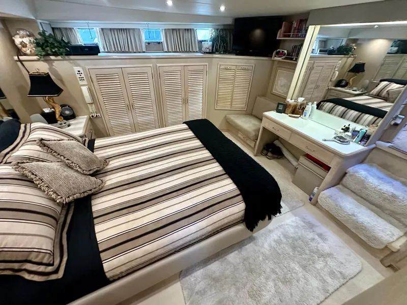Slide: The Image of Luxurious bedroom on a 1993 Tollycraft 57 Pilothouse yacht. - 15