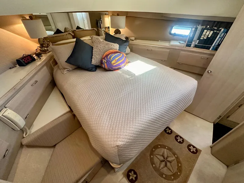 Slide: The Image of Luxurious bedroom on a 1993 Tollycraft 57 Pilothouse yacht. - 19