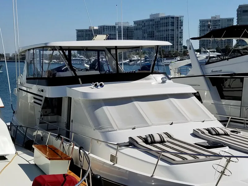Slide: The Image of 1993 Tollycraft 57 Pilothouse with windows and horns, close-up view. - 28