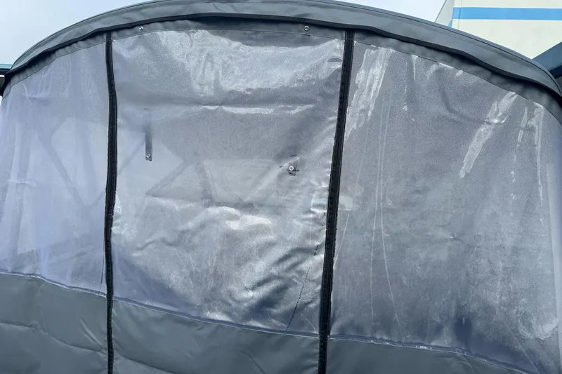 Slide: The Image of Protective cover on KingFisher 2025 Escape boat, 2026 model, showcasing durable material. - 18