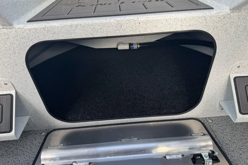 Slide: The Image of Storage compartment of 2026 KingFisher 2025 Escape boat, featuring durable interior design. - 29