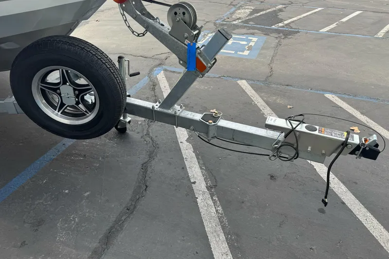 Slide: The Image of Trailer hitch of 2026 KingFisher 2025 Escape boat in parking lot. - 4