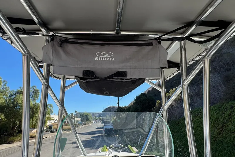 Slide: The Image of 2020 Wellcraft 222 Fisherman boat with Smith storage bag on T-top frame. - 37