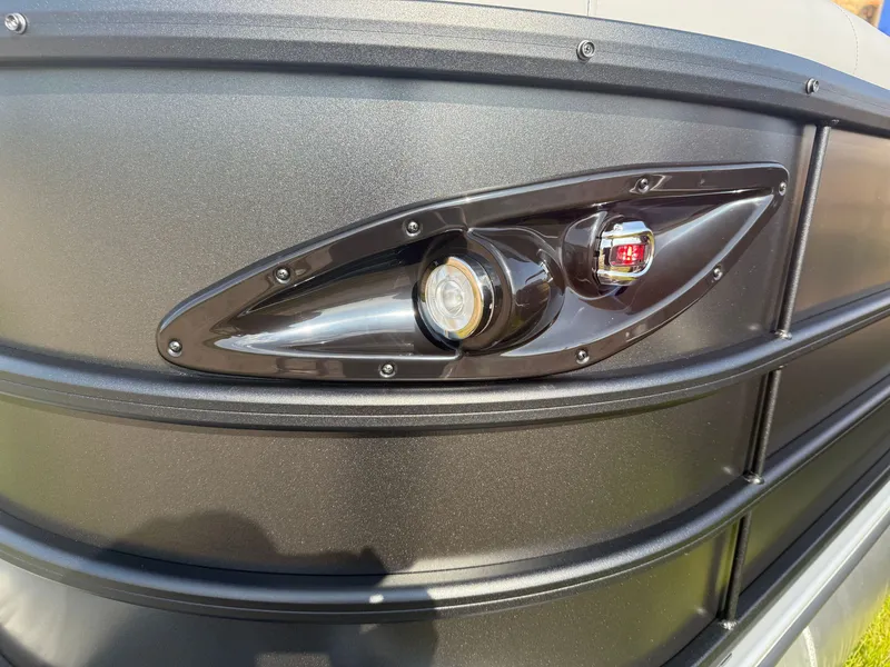 Slide: The Image of Close-up of 2026 Bentley Pontoons Legacy 300HP Tritoon light. - 38