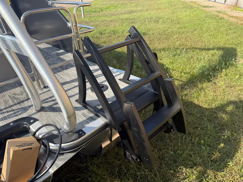 Slide: The Image of Bentley Pontoons Legacy 300HP Tritoon with folding ladder, 2026 model. - 42