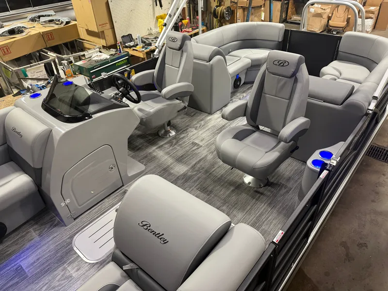 Slide: The Image of Interior of Bentley Pontoons Legacy 300HP 243 Navigator Tritoon, 2026 model. - 3