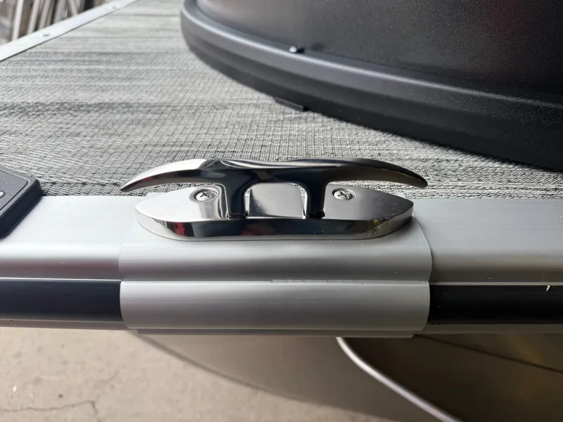 Slide: The Image of Close-up of a boat deck cleat on a Bentley Pontoons Tritoon. - 37
