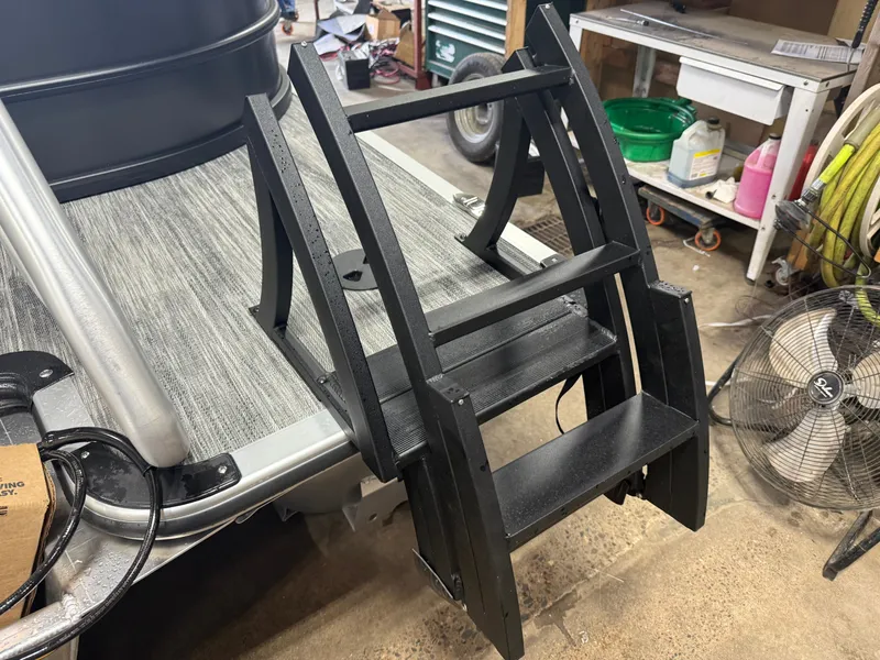 Slide: The Image of Bentley Pontoons Legacy 300HP 243 Navigator Tritoon ladder, 2026 model. - 43