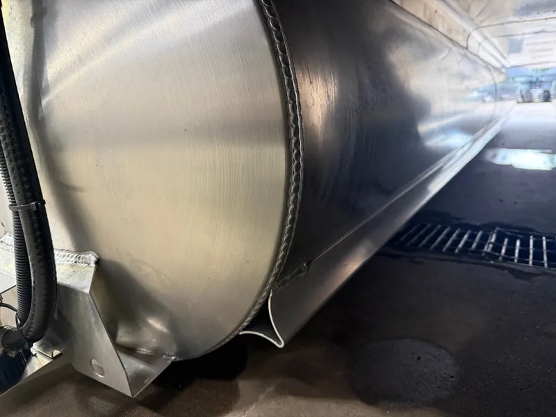 Slide: The Image of Close-up of a Bentley Pontoons Legacy 300HP 243 Navigator Tritoon. - 44