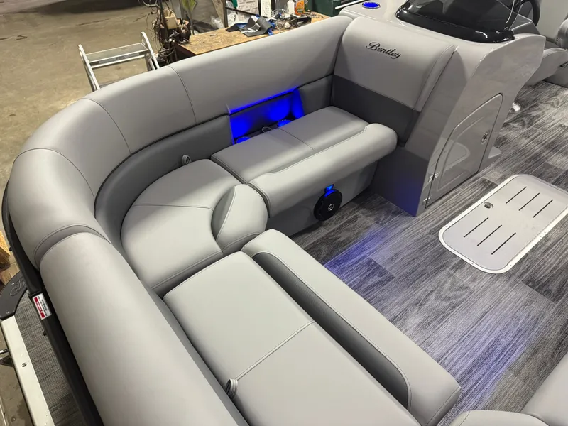 Slide: The Image of Interior of Bentley Pontoons Legacy 300HP 243 Navigator Tritoon, 2026 model. - 9
