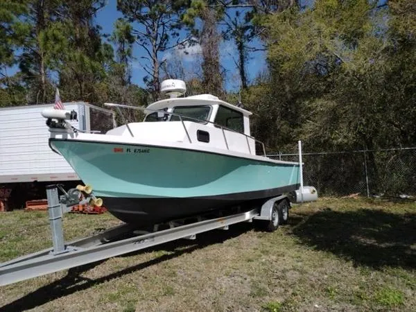 Slide: The Image of Parker Marine Sport Cabin Deep Vee 1995 - 8