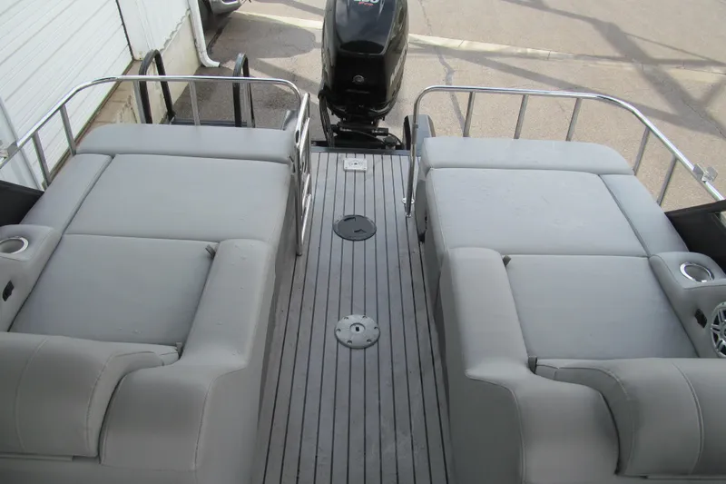 Slide: The Image of 2017 Regency 220 LE3 Sport boat with spacious seating and sleek design. - 12