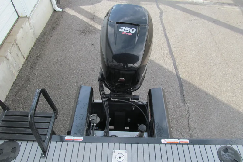 Slide: The Image of 2017 Regency 220 LE3 Sport boat with 250 Pro outboard motor, rear view. - 13