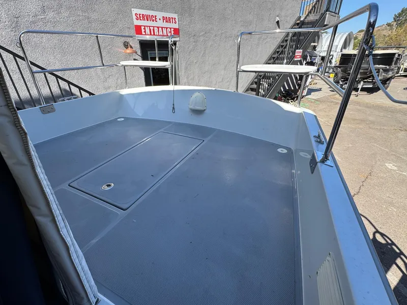 Slide: The Image of 2022 Duffy Sun Cruiser boat deck near service entrance. - 12