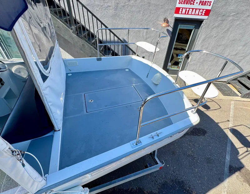 Slide: The Image of 2022 Duffy Sun Cruiser boat deck near service entrance. - 8