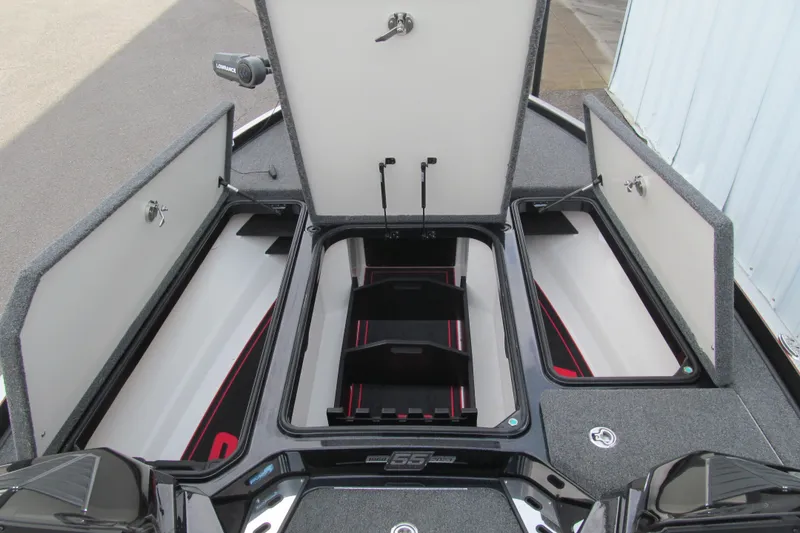 Slide: The Image of 2023 Ranger Z520R 55th Anniversary Limited Edition boat storage compartments open. - 13
