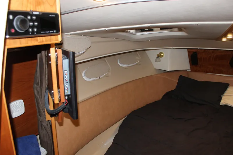 Slide: The Image of Interior cabin of 2016 Cutwater 30 Command Bridge with bed and entertainment system. - 11