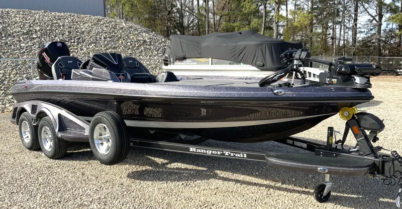 Slide: The Image of 2026 Ranger Z Comanche Z520R Ultra on trailer outdoors. - 8
