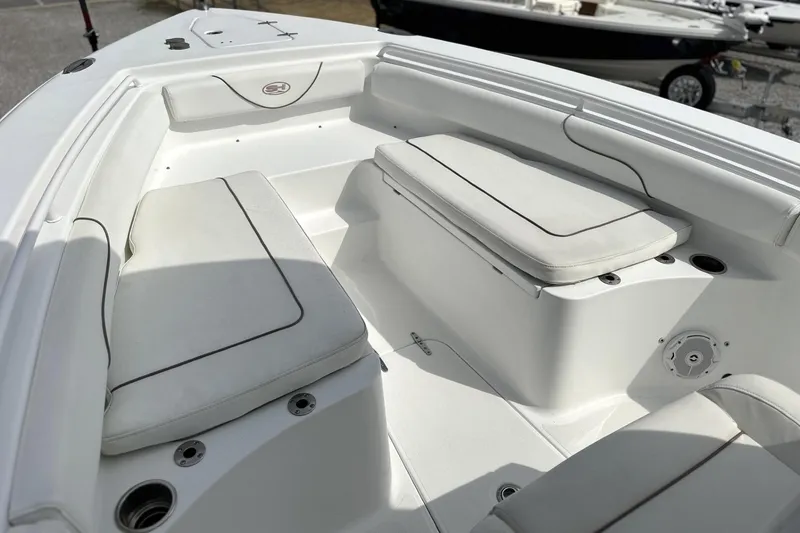 Slide: The Image of 2018 Sea Hunt Gamefish 27 Forward Seating, featuring spacious white cushioned seats. - 13