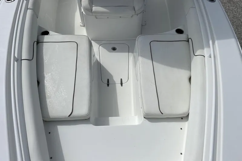 Slide: The Image of 2018 Sea Hunt Gamefish 27 Forward Seating, white cushioned seats, spacious layout. - 14