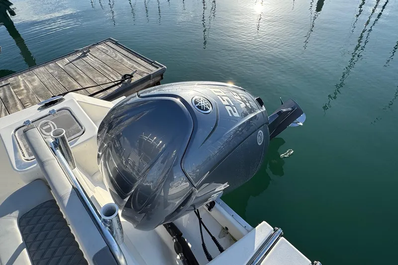 Slide: The Image of 2025 Defiance Catalina 240 boat with Yamaha outboard motor at dock. - 39