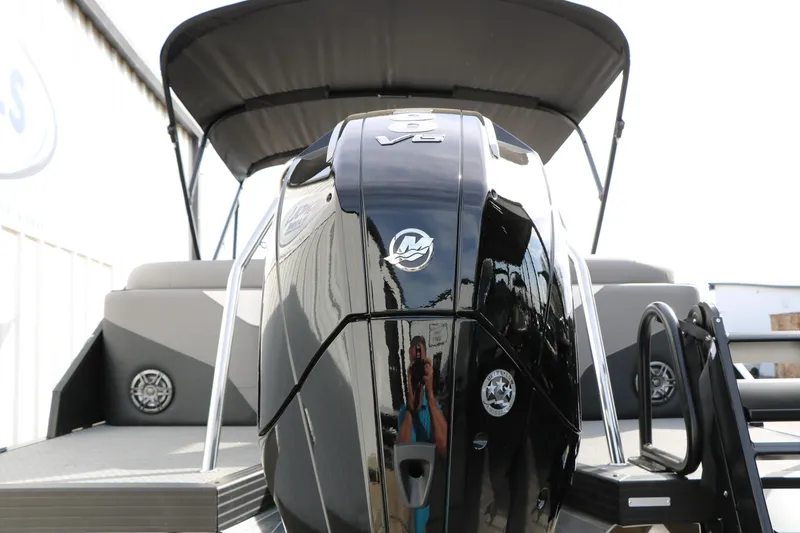 Slide: The Image of 2026 Evotti 521QL boat with powerful outboard motor, sleek design, and modern features. - 12