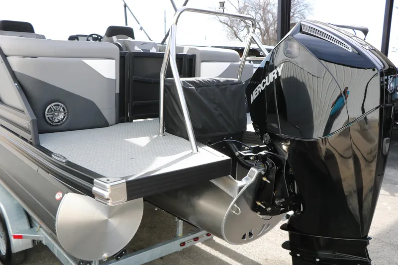 Slide: The Image of Evotti 521QL 2026 pontoon boat with Mercury outboard motor, rear deck view. - 13