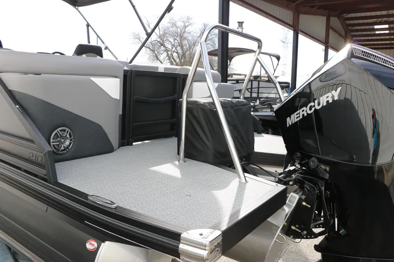 Slide: The Image of 2026 Evotti 521QL boat with Mercury engine, featuring spacious deck and modern design. - 15