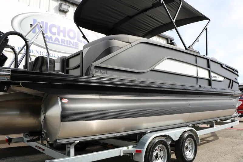 Slide: The Image of 2026 Evotti 521QL pontoon boat on trailer at Nichols Marine dealership. - 17