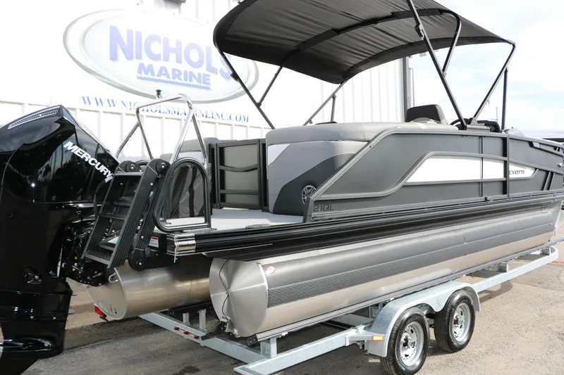 Slide: The Image of 2026 Evotti 521QL pontoon boat on trailer at Nichols Marine dealership. - 3