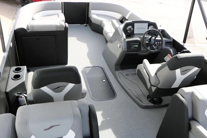 Slide: The Image of Interior of 2026 Evotti 521QL boat with modern seating and steering console. - 33