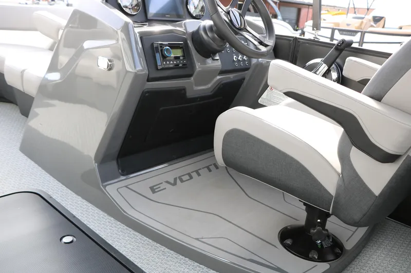 Slide: The Image of Interior of 2026 Evotti 521QL boat, featuring modern steering and control panel. - 35