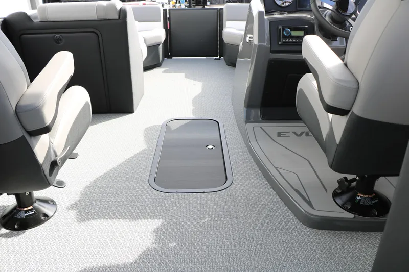 Slide: The Image of Interior of 2026 Evotti 521QL boat with modern seating and control panel. - 37